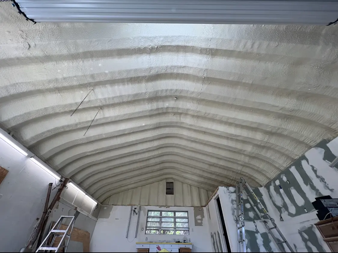 Spray polyurethane foam applied to the underside of a metal roof deck in Fox Chapel